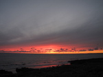 SX16497 Red and orange sky at sunset at Ogmore by Sea.jpg
